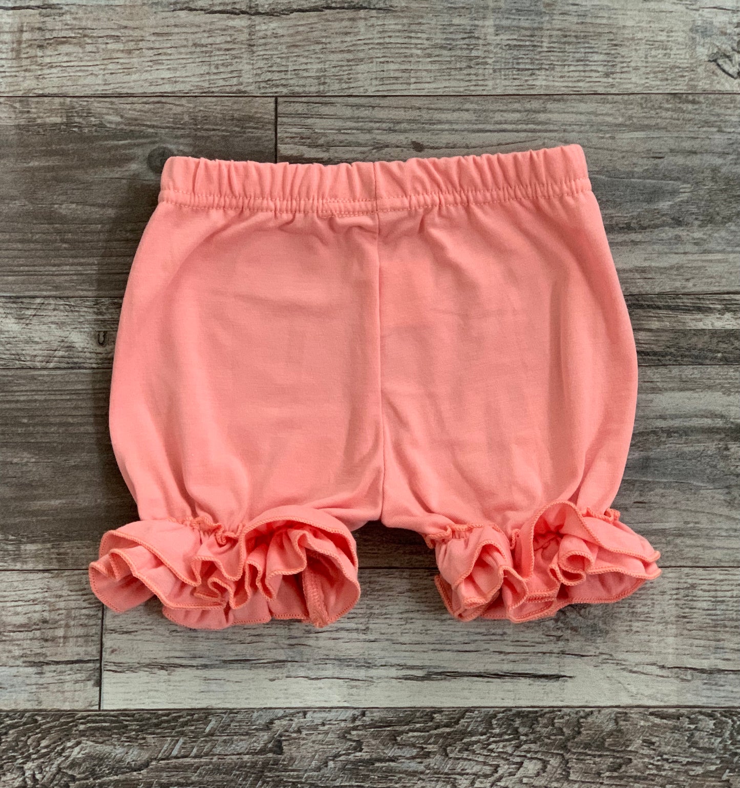 Coral ruffle shorts